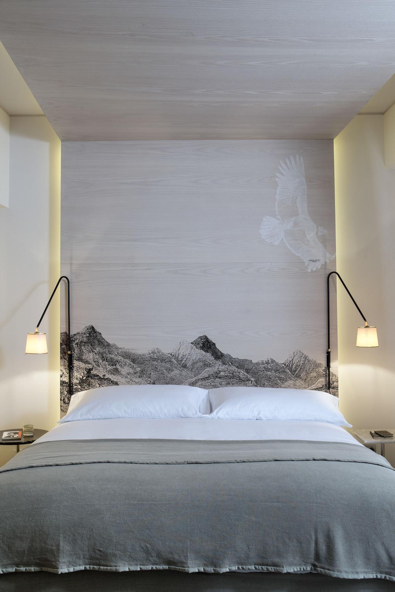Hotel Magnolia Сантьяго Экстерьер фото A bed with a headboard