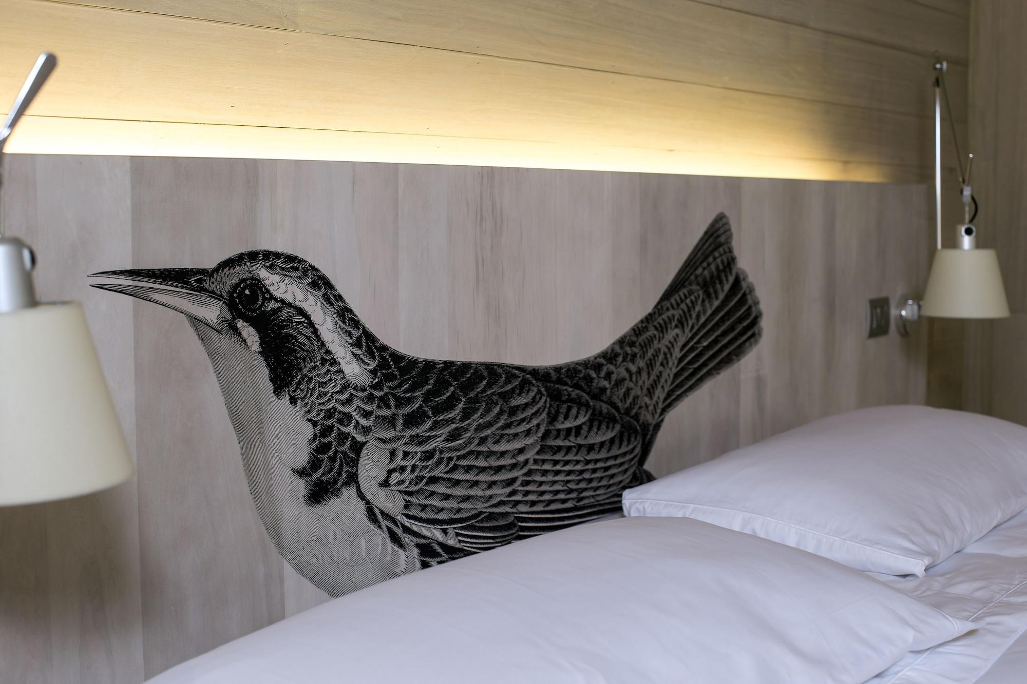 Hotel Magnolia Сантьяго Экстерьер фото A bed with a headboard